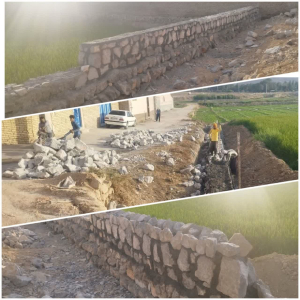 گزارش تصویری  اجرای عملیات دیوار سنگی حائل کوچه شهید مرتضی باقری در راستای ایمن سازی و آزاد سازی معبر